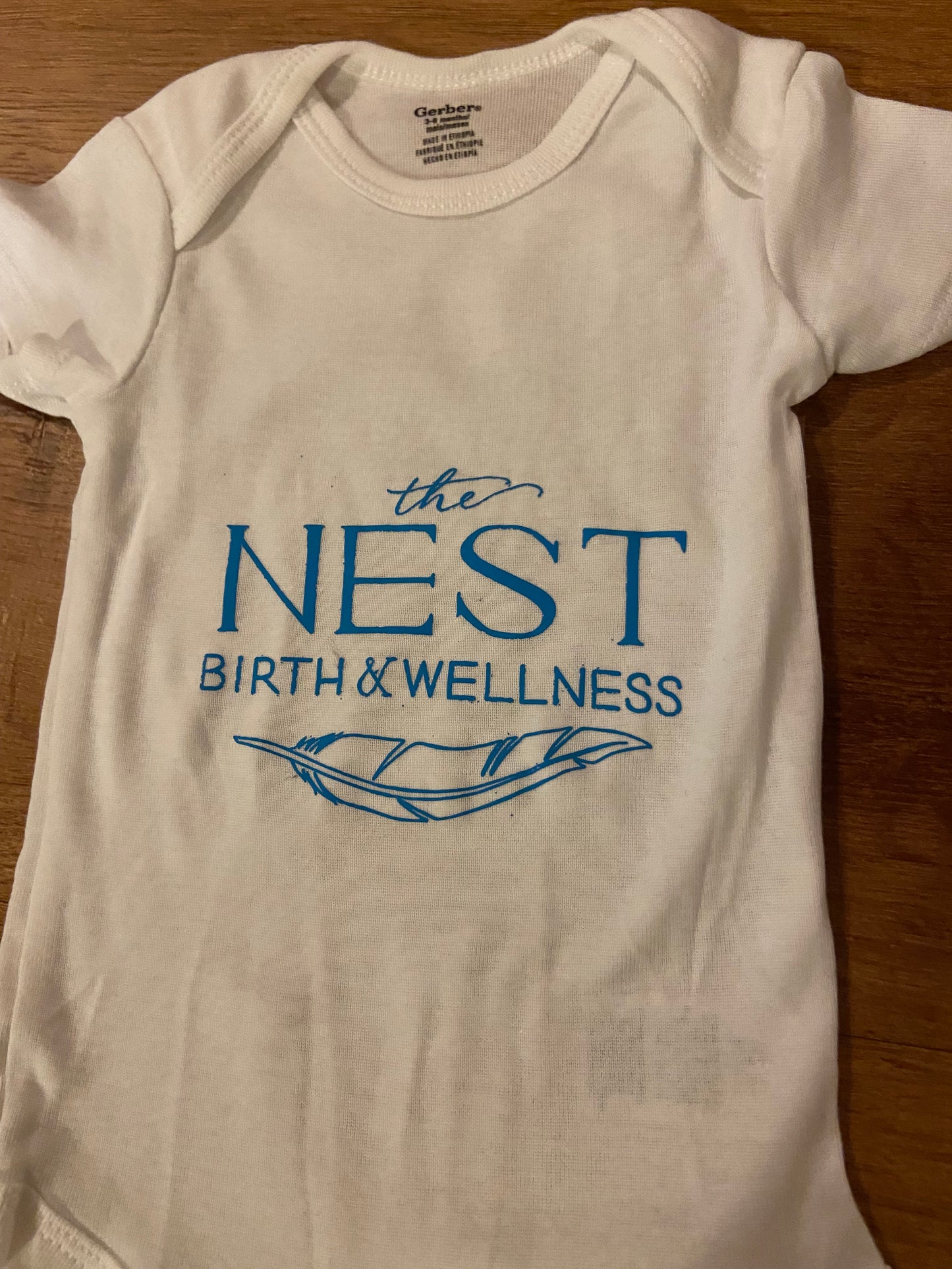 The Nest Onesie